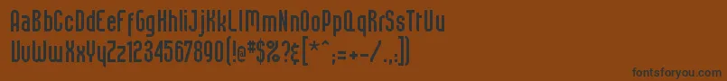 フォントSpreadtall – 黒い文字が茶色の背景にあります