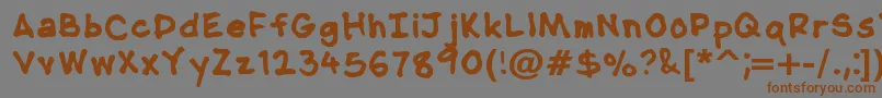NipcensHandwritingBold Font – Brown Fonts on Gray Background