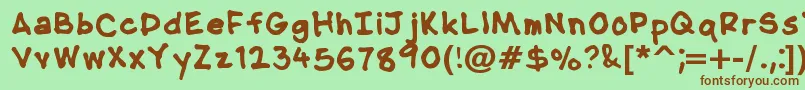 NipcensHandwritingBold Font – Brown Fonts on Green Background
