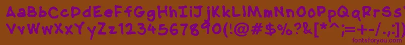 NipcensHandwritingBold-fontti – violetit fontit ruskealla taustalla