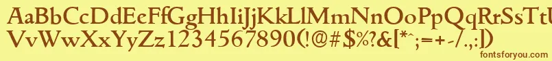 フォントGouditaserialMediumRegular – 茶色の文字が黄色の背景にあります。