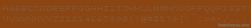 Bpdotsunicaseminus-fontti – harmaat kirjasimet ruskealla taustalla