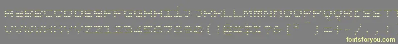 Czcionka Bpdotsunicaseminus – żółte czcionki na szarym tle