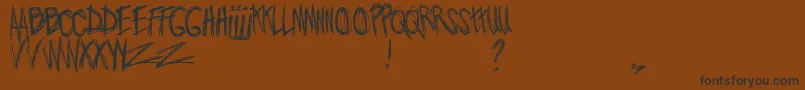 JoWroteALovesong-Schriftart – Schwarze Schriften auf braunem Hintergrund