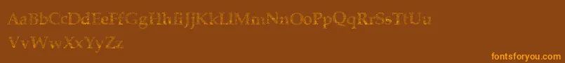 Czcionka Halffaded – pomarańczowe czcionki na brązowym tle