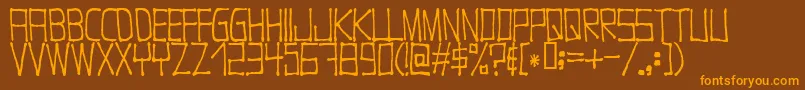 Czcionka Nugacity – pomarańczowe czcionki na brązowym tle