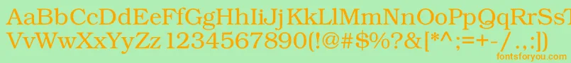 フォントKacsttitle – オレンジの文字が緑の背景にあります。