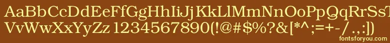 Kacsttitle-fontti – keltaiset fontit ruskealla taustalla