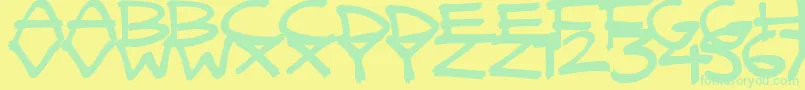 QuickyBrush Font – Green Fonts on Yellow Background