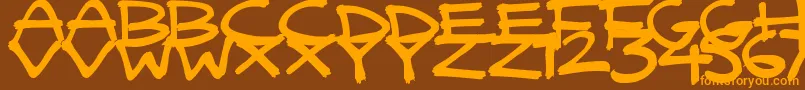 QuickyBrush Font – Orange Fonts on Brown Background