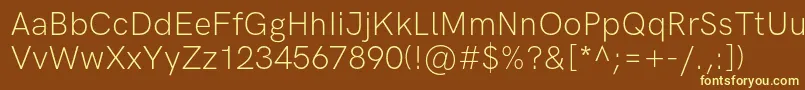 HkgroteskLightlegacy Font – Yellow Fonts on Brown Background