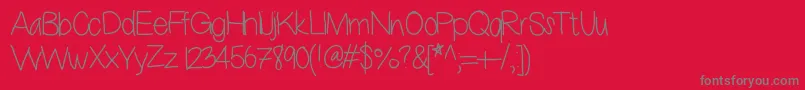 Thissux Font – Gray Fonts on Red Background