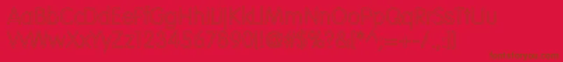 VogueNormalHollow-Schriftart – Braune Schriften auf rotem Hintergrund