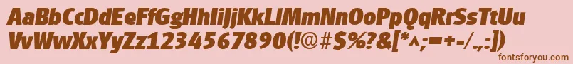 Fonte GouditaSansHeavySfBoldItalic – fontes marrons em um fundo rosa