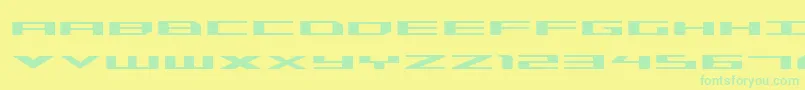 フォントTriremeexp – 黄色い背景に緑の文字