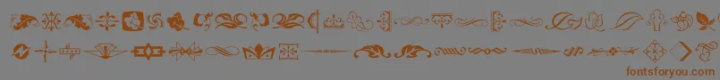 Czcionka TypeEmbellishmentsTwoLetPlain.1.0 – brązowe czcionki na szarym tle
