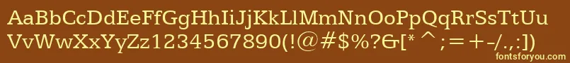 Egyptian505Bt-fontti – keltaiset fontit ruskealla taustalla
