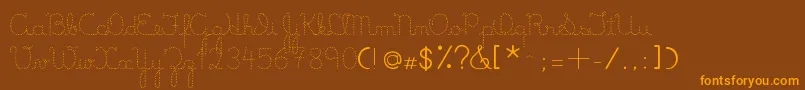 フォントLumenDots – オレンジ色の文字が茶色の背景にあります。