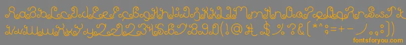 フォントEtherealSky – オレンジの文字は灰色の背景にあります。