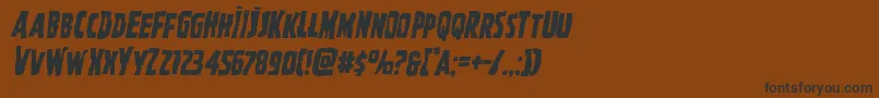 フォントGhoulishintentmangleital – 黒い文字が茶色の背景にあります