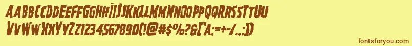 フォントGhoulishintentmangleital – 茶色の文字が黄色の背景にあります。