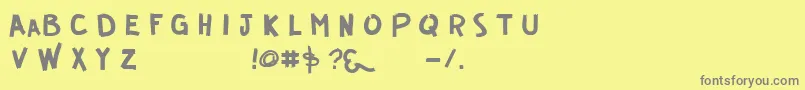 フォントGuerrilla – 黄色の背景に灰色の文字