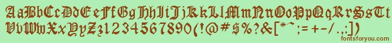 GothicrusCondenced Font – Brown Fonts on Green Background