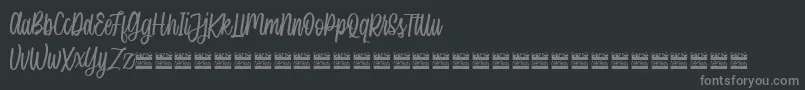 フォントSingleBrandDemo – 黒い背景に灰色の文字