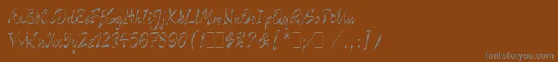 フォントWildThingLetPlain.1.0 – 茶色の背景に灰色の文字