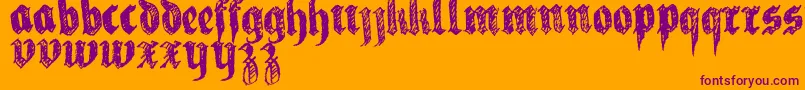 LaFraktouille-Schriftart – Violette Schriften auf orangefarbenem Hintergrund