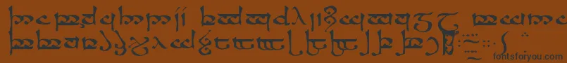 フォントMoroma – 黒い文字が茶色の背景にあります