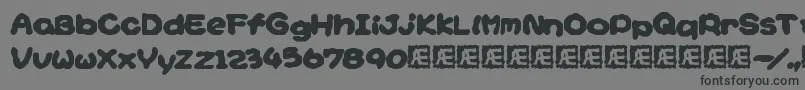 YoshisStoryGameTextBrk Font – Black Fonts on Gray Background