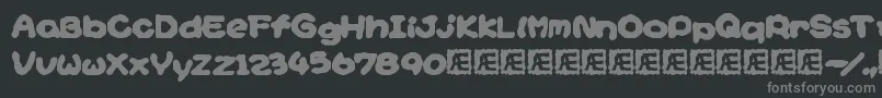 フォントYoshisStoryGameTextBrk – 黒い背景に灰色の文字