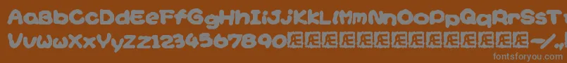 Więcej informacji o czcionce YoshisStoryGameTextBrk Czcionka YoshisStoryGameTextBrk – szare czcionki na brązowym tle
