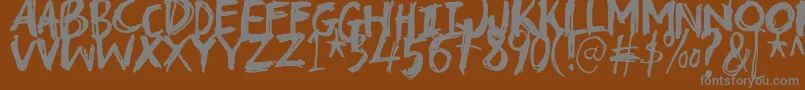 Troublemarkerdemo Font – Gray Fonts on Brown Background