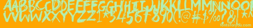 Troublemarkerdemo-Schriftart – Grüne Schriften auf orangefarbenem Hintergrund