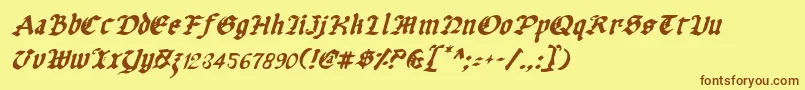 フォントUberv2i – 茶色の文字が黄色の背景にあります。