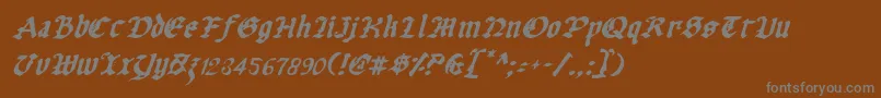 フォントUberv2i – 茶色の背景に灰色の文字