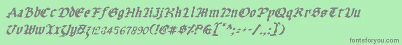 フォントUberv2i – 緑の背景に灰色の文字