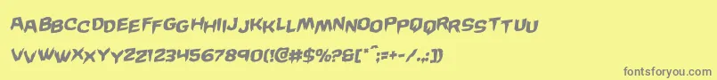 Wickermanstagrotal-fontti – harmaat kirjasimet keltaisella taustalla