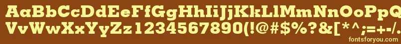 MemphisLtExtraBold-fontti – keltaiset fontit ruskealla taustalla