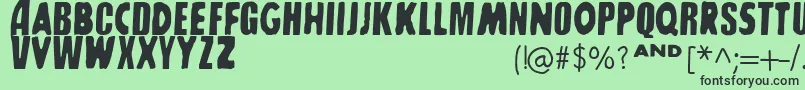 SharkboyLavagirl-Schriftart – Schwarze Schriften auf grünem Hintergrund