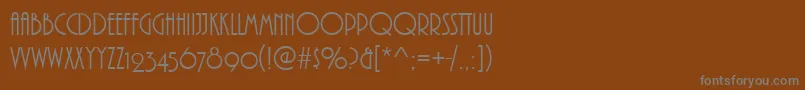 PizzicatoOsfRegular-fontti – harmaat kirjasimet ruskealla taustalla