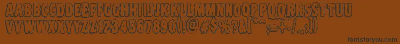 Vtcnightofthedrippydeadouttie Font – Black Fonts on Brown Background