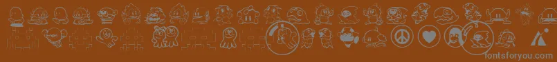 Tas2k3-Schriftart – Graue Schriften auf braunem Hintergrund