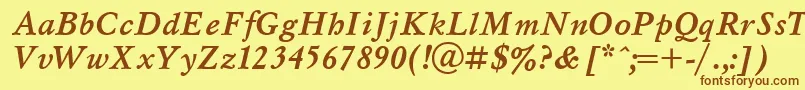 フォントMyslBolditalicCyrillic – 茶色の文字が黄色の背景にあります。