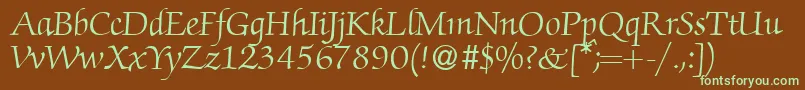 フォントZabriskiescriptRegularDb – 緑色の文字が茶色の背景にあります。