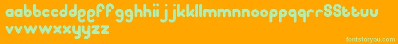 Pooplatter Font – Green Fonts on Orange Background