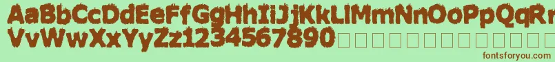 HairyMonsterSolid-fontti – ruskeat fontit vihreällä taustalla