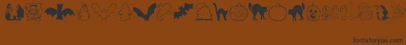 AezHalloweenDingbats Font – Black Fonts on Brown Background